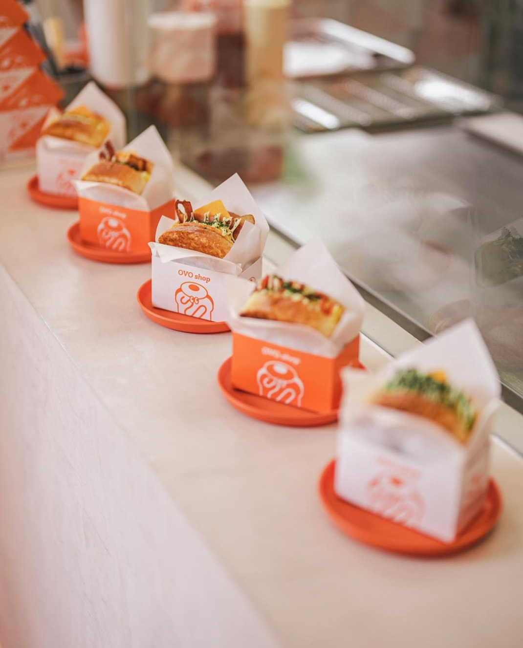 简餐餐厅OVO shop 泰国 曼谷 简餐 面包店 快餐 橙色 logo设计 vi设计 空间设计